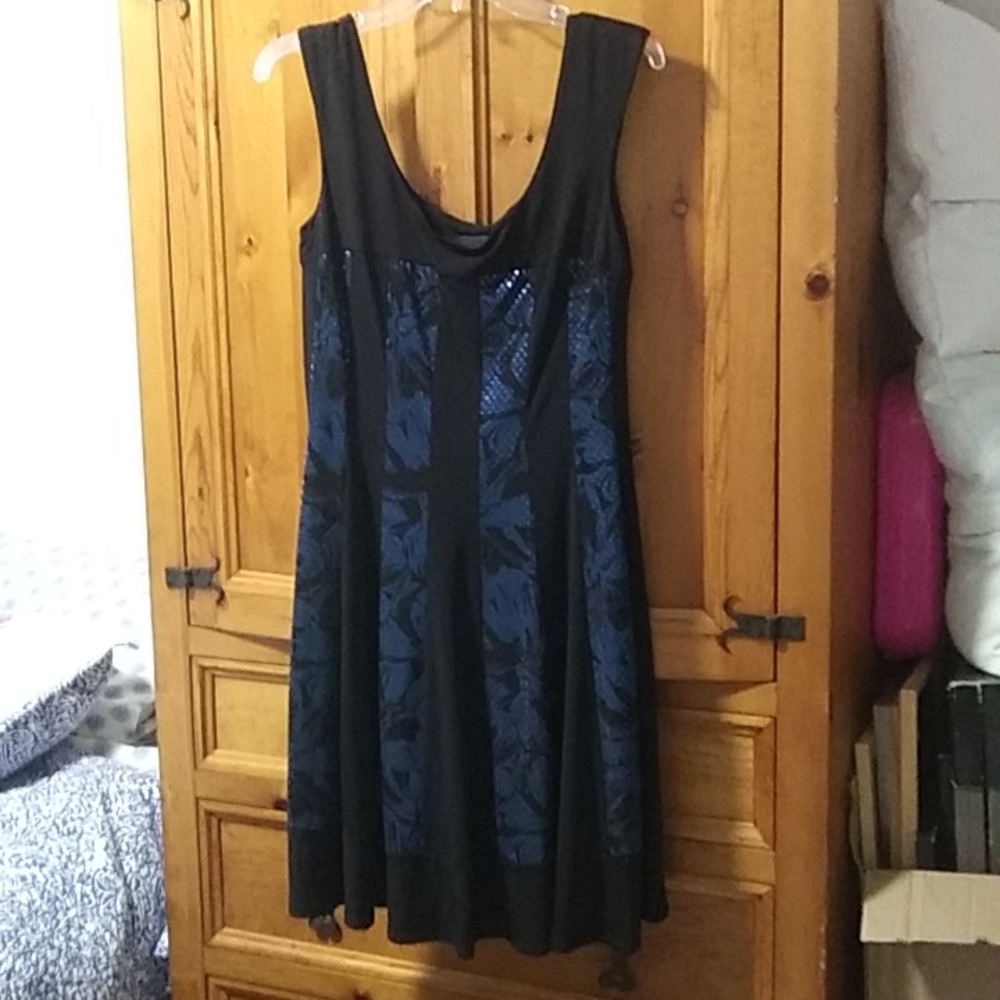 Dress sz10 in black with blue sequin design strips black hem border